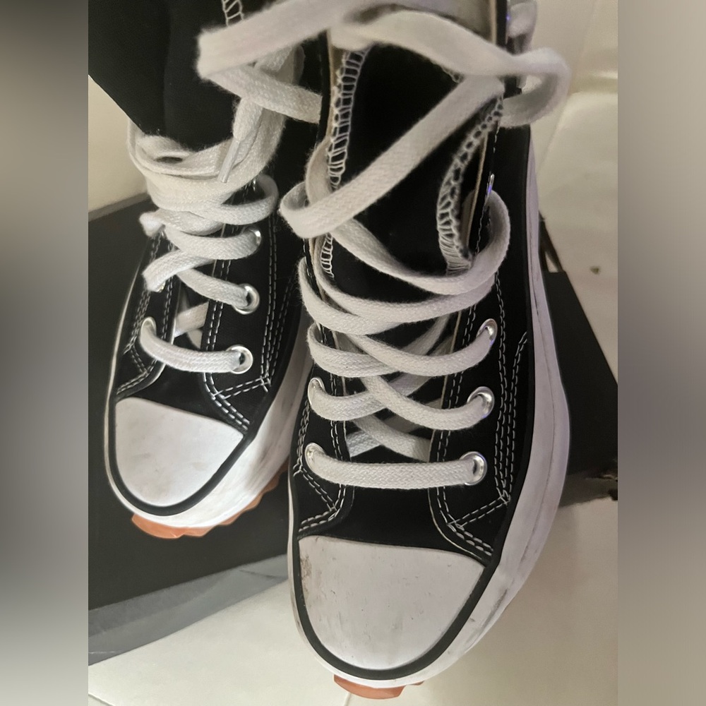 Chucky black-and-whiteConverse. Worn only a few times men’s size 5.